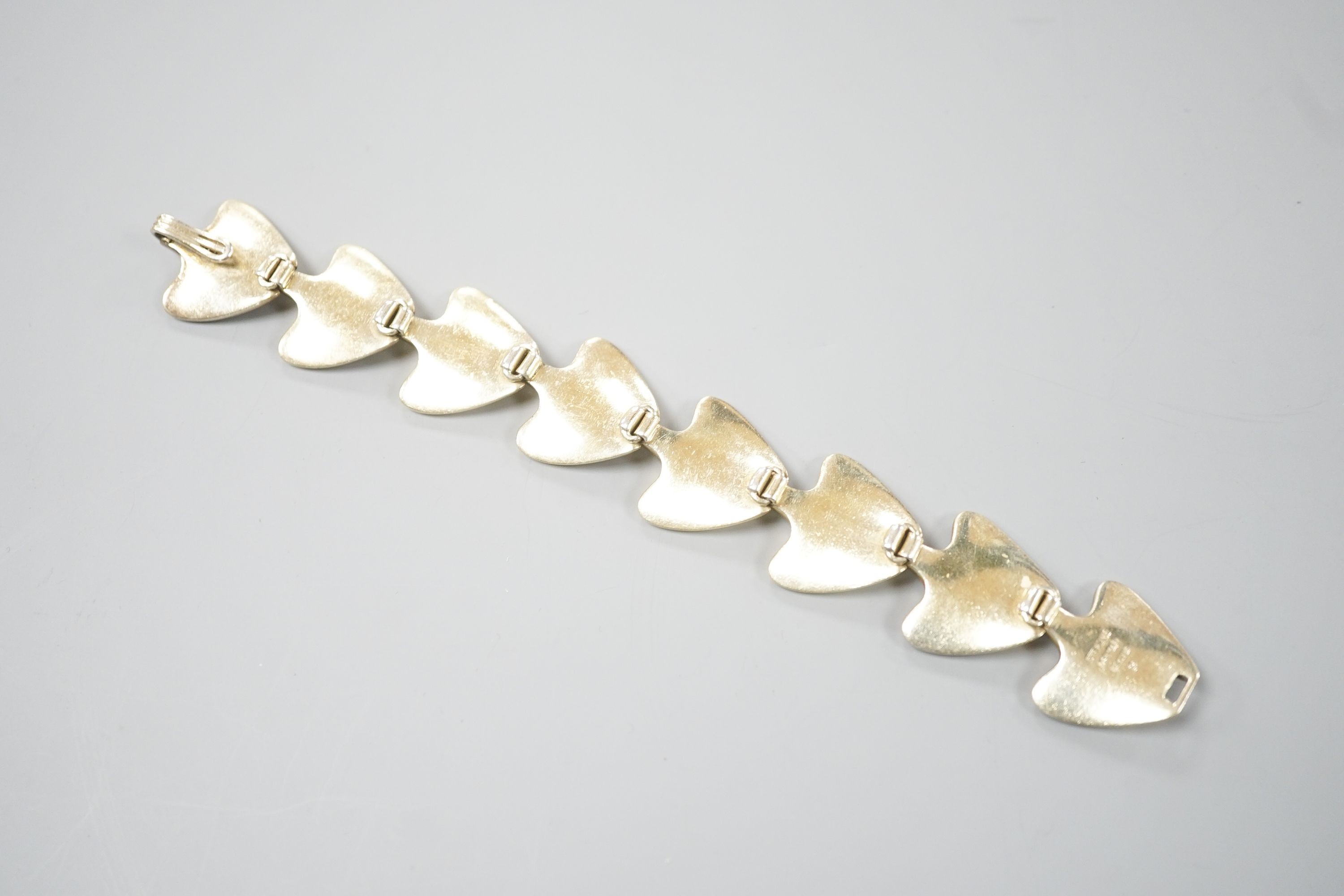 A 20th century Danish gilt sterling bracelet by Bent Knudson, 18.3cm.